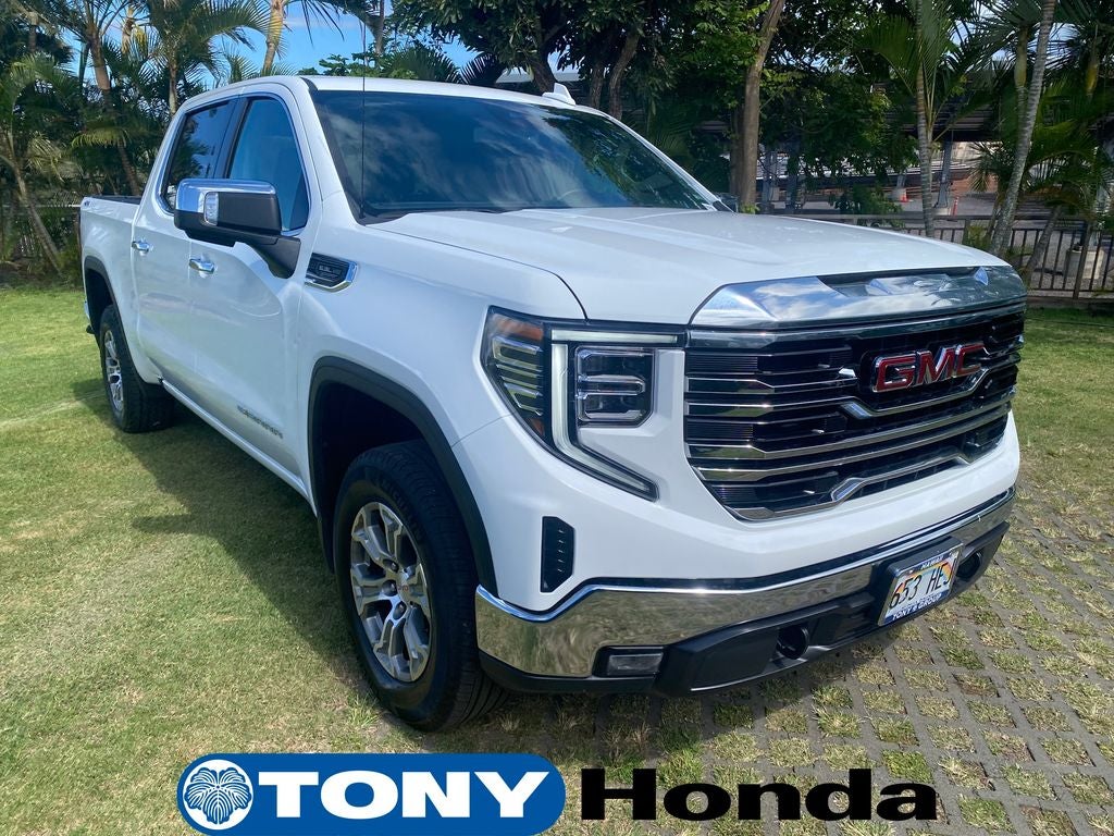 2025 GMC Sierra 1500 SLT in Summit White — front three-quarter view