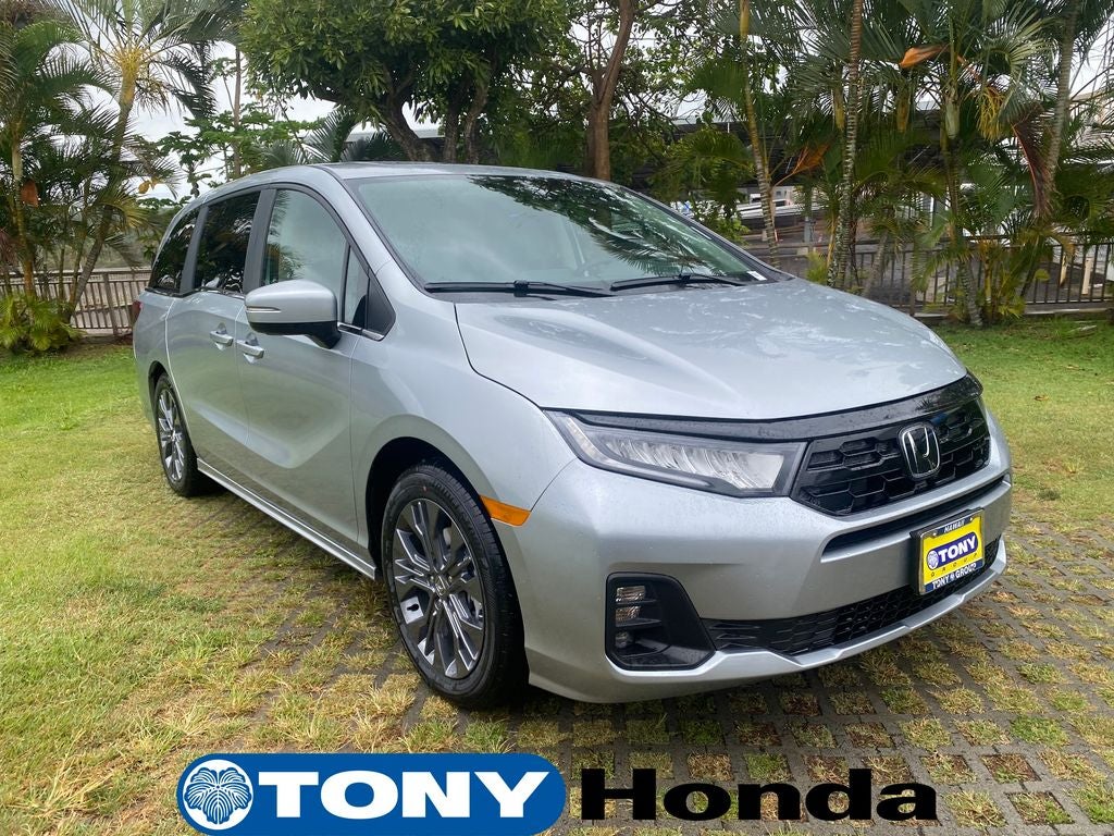 2026 Honda Odyssey Touring in Solar Silver Metallic — front three-quarter view