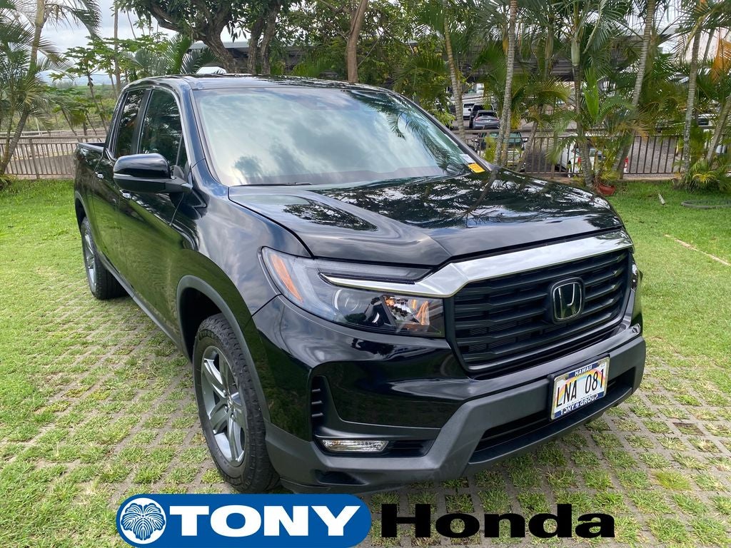 2023 Honda Ridgeline RTL in Crystal Black Pearl — front three-quarter view