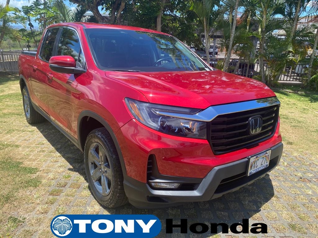 2023 Honda Ridgeline RTL in Radiant Red Metallic II — front three-quarter view