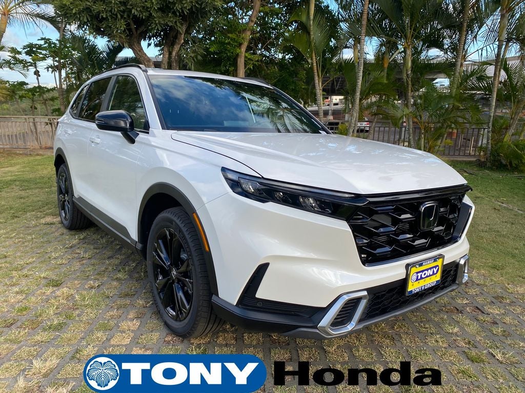 2026 Honda CR-V Hybrid Sport Touring in Platinum White Pearl — front three-quarter view