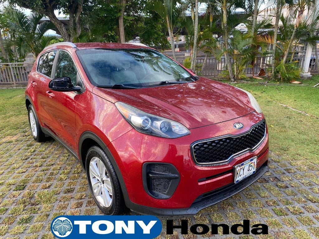 2017 Kia Sportage LX in Hyper Red — front three-quarter view