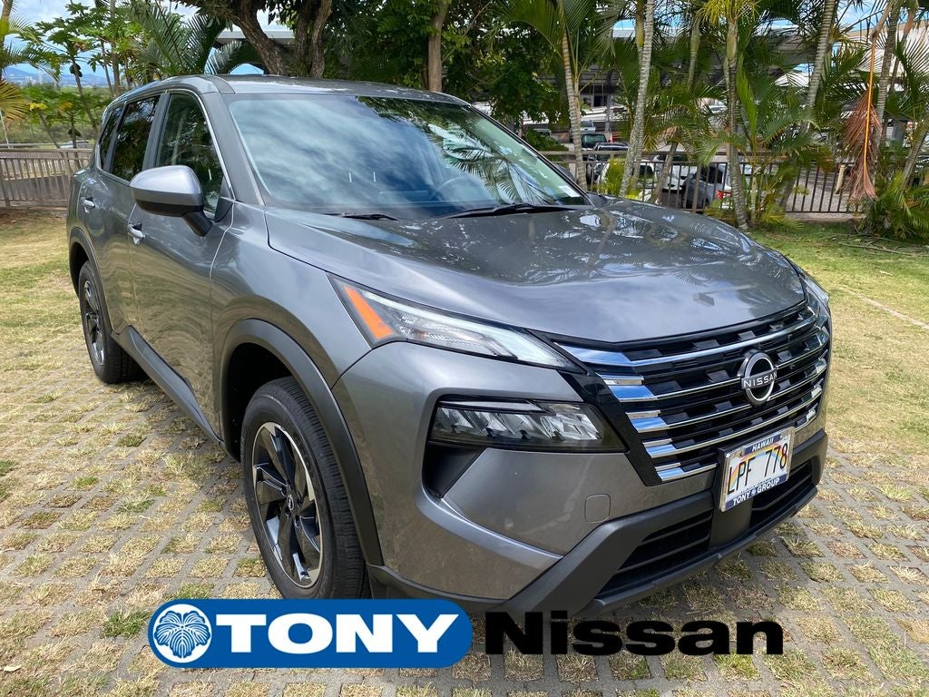 2025 Nissan Rogue SV in Gun Metallic — front three-quarter view